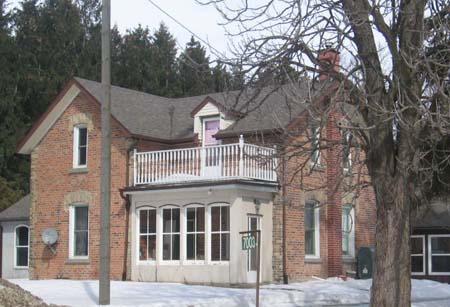 South and West Elevations of 7003 Highway 6