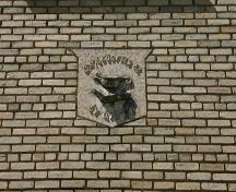 View of the insignia above the entrance at the Brandon Citizens' Science Building, Brandon, 2005; Historic Resource Branch, Manitoba Culture, Heritage, Tourism and Sport, 2005