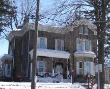 The outstanding wooden frieze is clearly visible under the eaves of the house in this image, 2007.; Lindsay Benjamin, 2007.