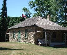 Of note are the hip roof and cobblestone construction.; Kendra Green, 2007.