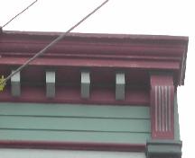 This image provides a view of the cornice ornamented by dentils and supported by wood brackets, 2005; City of Saint John