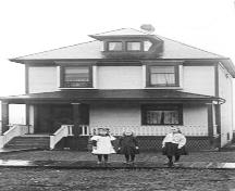 Historic view of Archibald Residence. Gill sisters (next door neighbours) in foreground.; North Vancouver Museum and Archives; #2547.