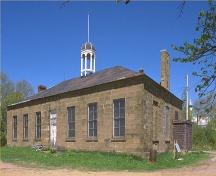 Corner view of the Marine Hospital, showing two façades and the cupola on the roof, 1991.; Parks Canada Agency/ Agence Parcs Canada, 1991.