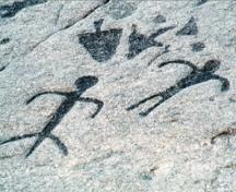 Detail view of the petroglyphs at Peterborough Petroglyphs National Historic Site of Canada, 1993.; Parks Canada Agency / Agence Parcs Canada, B. Morin, 1993.