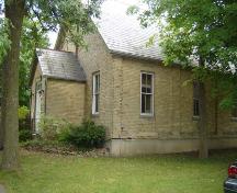 Of note is the slate roof and white brick construction.; Kayla Jonas, 2007.
