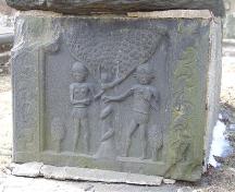 Adam & Eve gravestone carved by James Hay in 1775, in memory of Mary Bulkeley, wife of the first Provincial Secretary Richard Bulkeley, Old Burying Ground, Halifax, 2007.; Heritage Division, NS Dept. of Tourism, Culture and Heritage, 2007