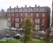 View looking south, main facade of Devon Row, St. John's, NL. Photo taken 2005.; HFNL 2005