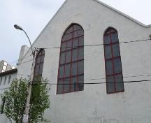 View of stained glass windows as seen on the western facade.  Photo taken June 8, 2007.; Deborah O'Rielly HFNL 2007
