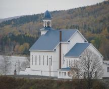 Photo of the rear of Saint-Thomas-d'Aquin Church with Lac Baker in the background; Madawaska Planning Commission