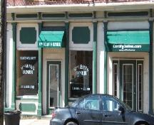 This photograph shows the southern storefront and the central entrance, 2005; City of Saint John