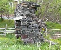 Photo showing side and fireplace opening of The Hearth, Branch, NL, 2008; Andrea O'Brien, HFNL, 2008