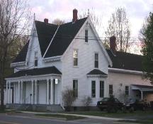 View of the northeast elevation of dwelling which occupies the corner of Waterloo Row and Shore Street; City of Fredericton