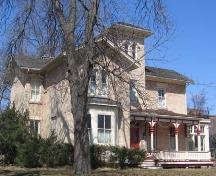 The low-hip roofline, characteristic of Italianate architecture, is portrayed in this image.; Lindsay Benjamin, 2007.