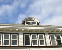 Window and roof details of the Bank of Commerce Building, The Pas, 2007; Historic Resources Branch, Manitoba Culture, Heritage, Tourism and Sport, 2007