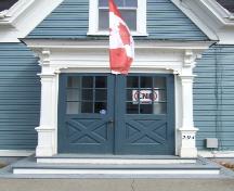 This photograph shows the entrance and detailed portico, 2008; Town of St. Andrews