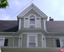 This photograph illustrates the dormer and bay window at the upper sections of the central bay above the entrance, 2008; Town of St. Andrews