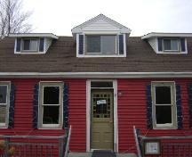 This photograph shows the central bay of the Doon Residence and illustrates the large dormer and entranceway, 2008; Town of St. Andrews