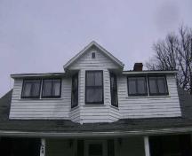 This photograph shows the elongated shed dormer, 2009; Town of St. Andrews