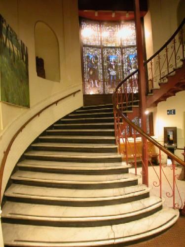 Stairway and stained glass windows