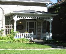Featured is the decorative wood veranda on the east side.; Paul Dubniak, 2008.