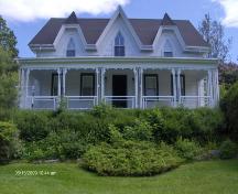 This photograph shows the contextual view of the rectory, 2009; Town of St. Andrews