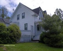 This photograph shows the side view of the rectory, 2009; Town of St. Andrews