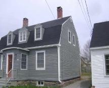 This photograph shows the side façade and the gambrel roof, 2009; Town of St. Andrews