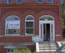 This photograph shows the handsome arches and the detailed brickwork of the front façade, 2009; Town of St. Andrews