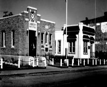Archival view showing Manitoba Telephone System Building (right), Carberry, ca. 1960; Carberry Plains Archives, ca, 1960