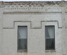 Detail view of wall and brick details of the Moon Apartments, Carberry, 2007; Historic Resources Branch, Manitoba Culture, Heritage, Tourism and Sport, 2007