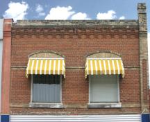 Detail view of the wall and roofline of the Kowalchuk Building, Carberry, 2008; Historic Resources Branch, Manitoba Culture, Heritage and Tourism, 2008