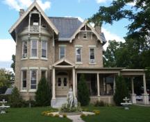 Of note are the gables with exposed rafters.; Kayla Jonas, 2008.