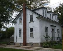 Of note is the red brick chimney.; Kayla Jonas, 2008.