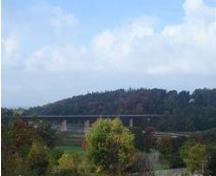 View looking west at the seven-span Menesetung Bridge.; Kayla Jonas, 2007.