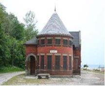 Featured is the stout, windowed-tower with peaked roof.; Chris Mahood, Ministry of Culture, 2006.