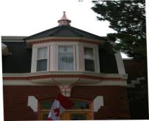 This image shows the oriel window above front door; City of Saint John