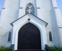 This photograph illustrates the handsome metal Gothic arch door, 2007.; Town of St. Andrews
