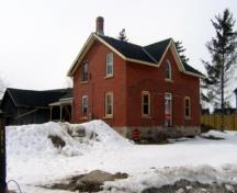 Of note is the single brick chimney, kitchen extension and drive shed.; Mary Tivy, 2008.
