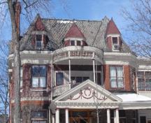 Of note is the front veranda pediment with frieze and swag design.; Paul Dubniak, 2008.