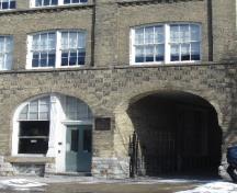 Featured are the vehicular and pedestrian entrances to the building.; Paul Dubniak, 2008.