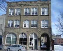 Of note are the four Romanesque arches on the first storey.; Paul Dubniak, 2008.