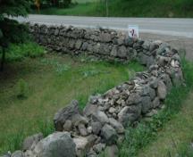 Featured is the dry stone fence, measuring 30 inches wide at base and 14 inches wide at top.; Sally Drummond, 2008.