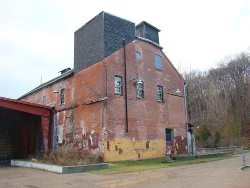 Exterior of sand-lime storage building.