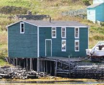 View of the left and front facades of Burrage’s Stage, New Perlican, NL. Photo taken 2009. ; HFNL/Andrea O'Brien 2009