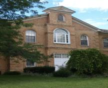 Of note is the buff-brick exterior.; Kayla Jonas, 2008.