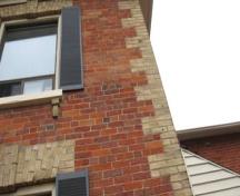 Of note is the arched entrance, yellow brick quoins and paired brackets.; Chelsey Tyers, 2008.