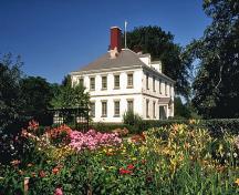 General view of Acacia Grove / Prescott House, showing the landscape of extensive gardens and orchards with the house as its focal point.; Parks Canada Agency / Agence Parcs Canada.