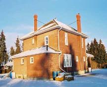 This image illustrates the rear of the Brick House as seen from the southwest.; City of Edmonton, 2004