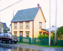 View of main and side facades, Church Road, Bonavista. Photo taken about 1995.; HFNL 2009