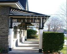 Featured is the veranda with ornate stylish woodwork.; City of Brantford, 2009